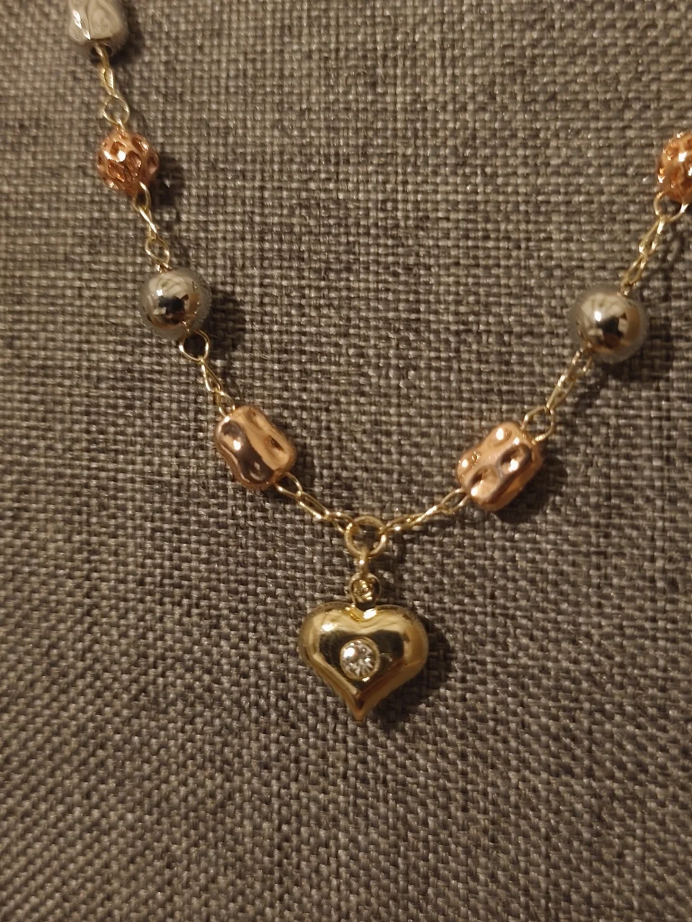 The surface is plated with a thin layer of real gold 14k